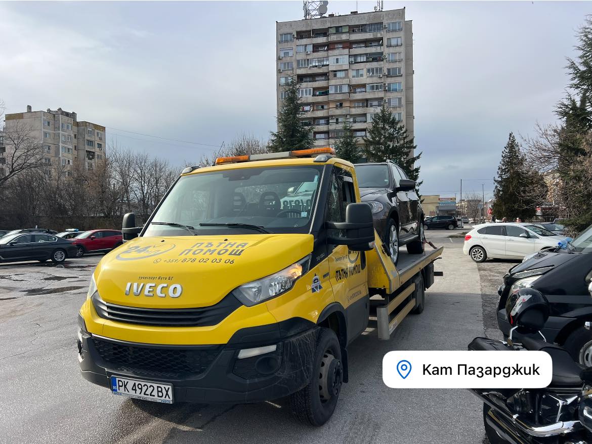 Прецизно качване на автомобила върху платформата на репатрака.